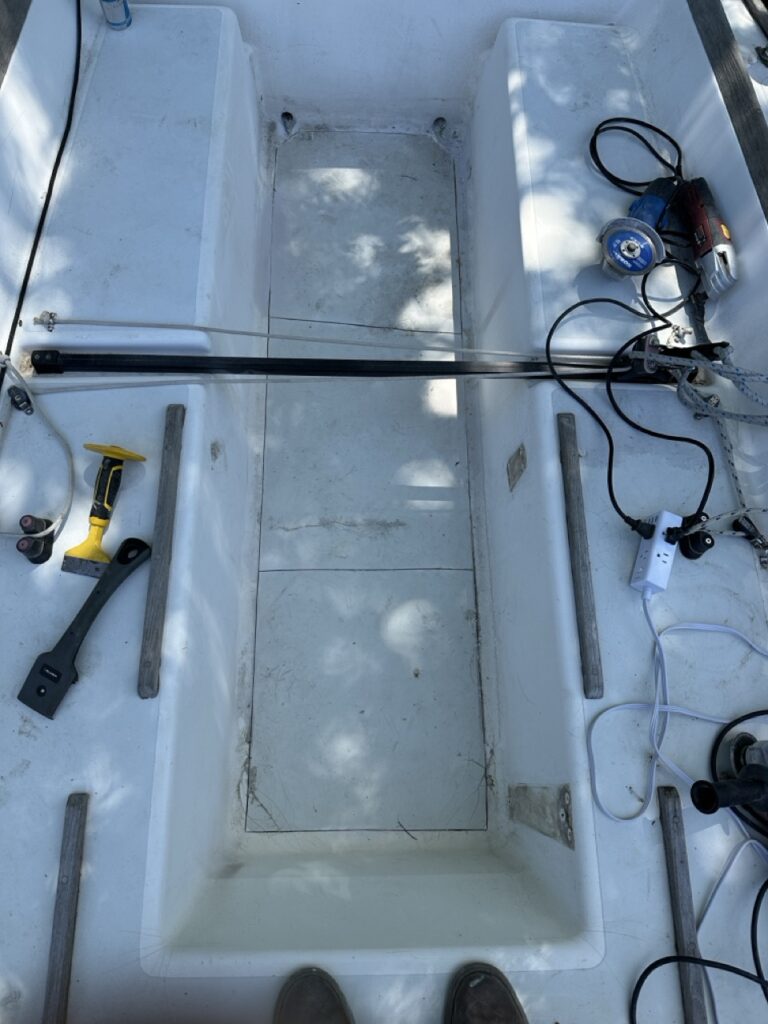 Overhead view of the cockpit with tools laid out for the repair