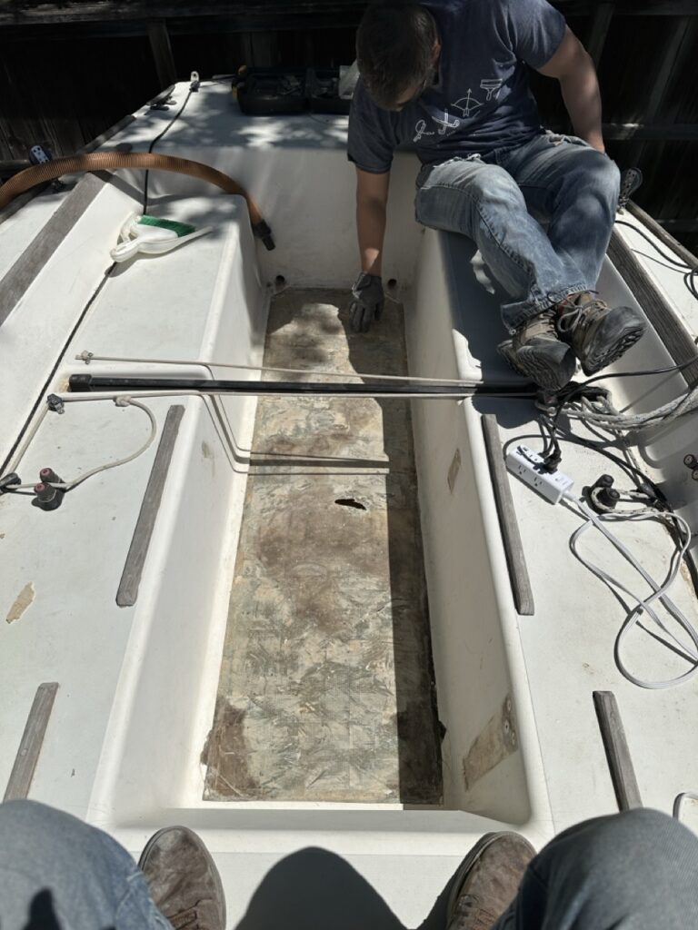 Working down in the cockpit, clearing the last of the old core